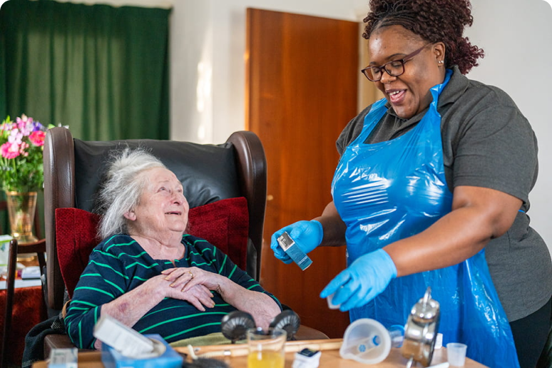 A Seren care professional supporting a woman at home